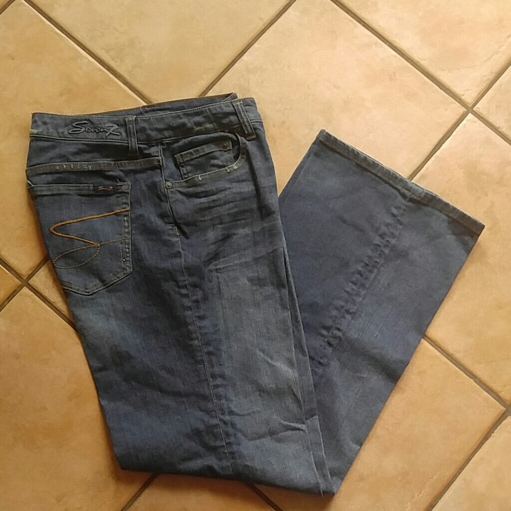 Seven women blue jeans